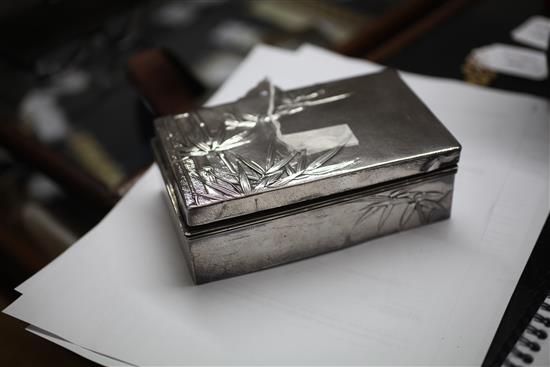 Three early 20th century Japanese textured silver toilet boxes, two signed Miyamoto Shoko, largest 6in.